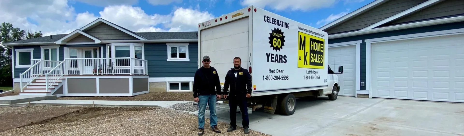 M&K Home Sales service crew in front of delivery truck